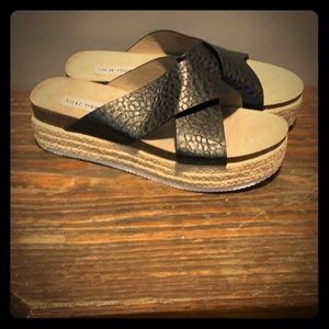 Steve Madden platform sandals.